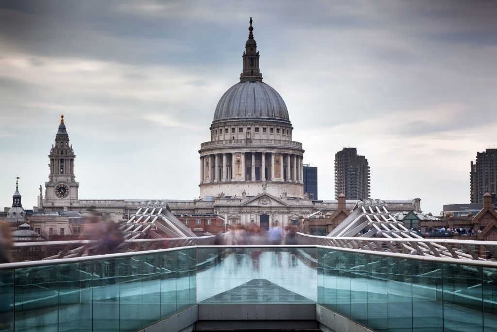 St. Paul's Cathedral London viewed from Millenium Bridge over the Thames.