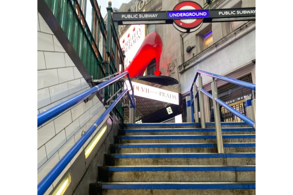 Stairs leading out of a London Underground station.