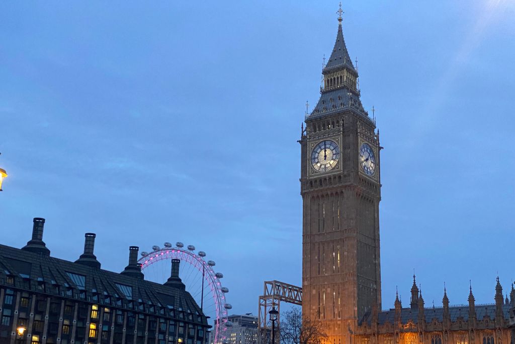 Evening view of Elizabeth Tower and the London Eye